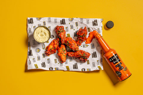 Chicken wings with Sauce Shop Buffalo Hot Sauce